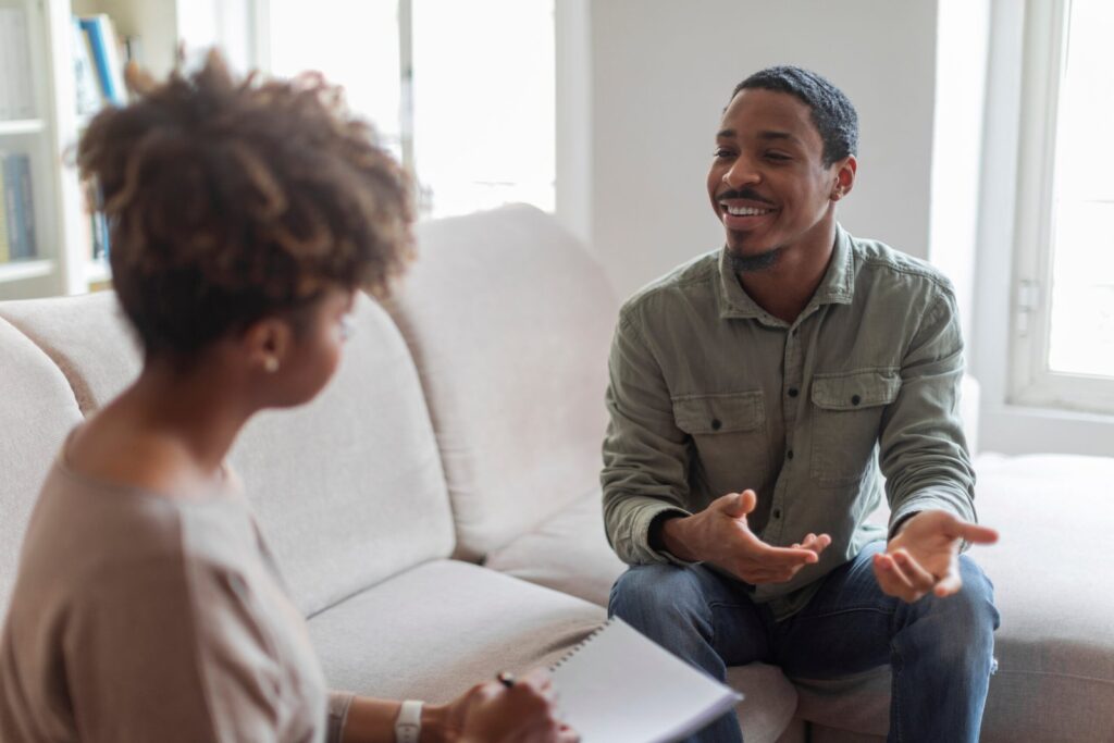 Black man talking to his therapist